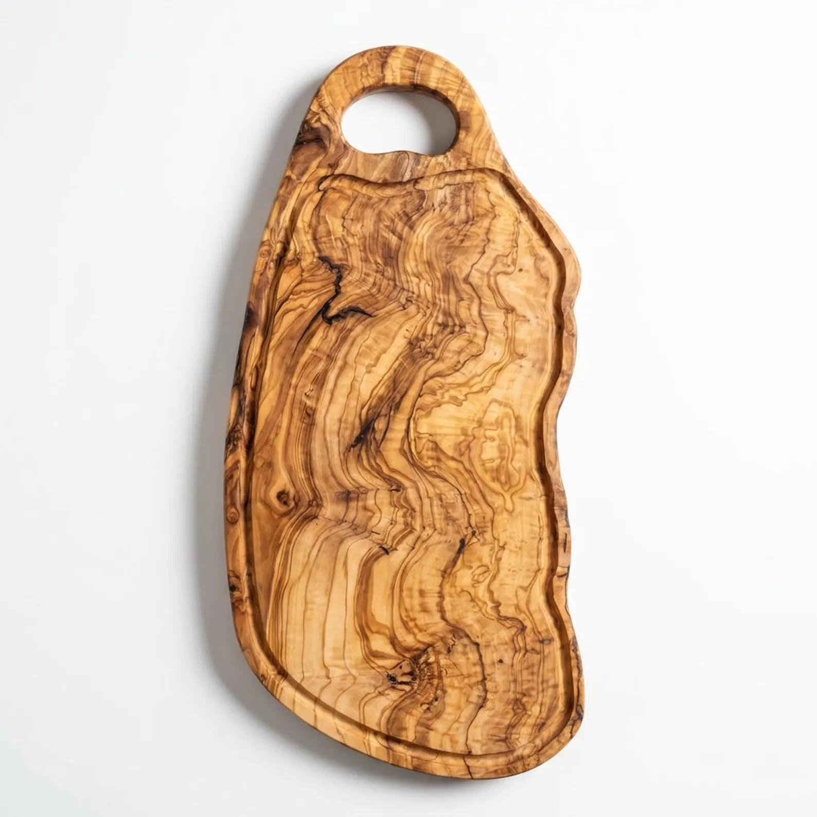 Handgefertigtes Charcuteriebrett aus massivem Olivenholz mit natürlicher Maserung, ideal zum Servieren von Käse und Antipasti – hochwertiges Geschenk mit kostenlosem Versand in der Schweiz